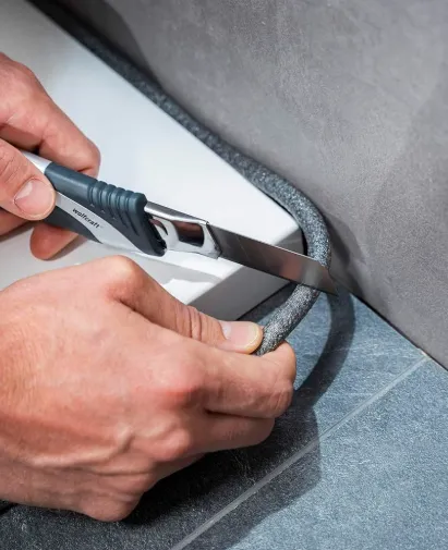 Installation d'un receveur de douche sur plots réglables