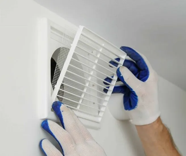 Schéma technique montrant l'emplacement des bouches VMC dans une cuisine